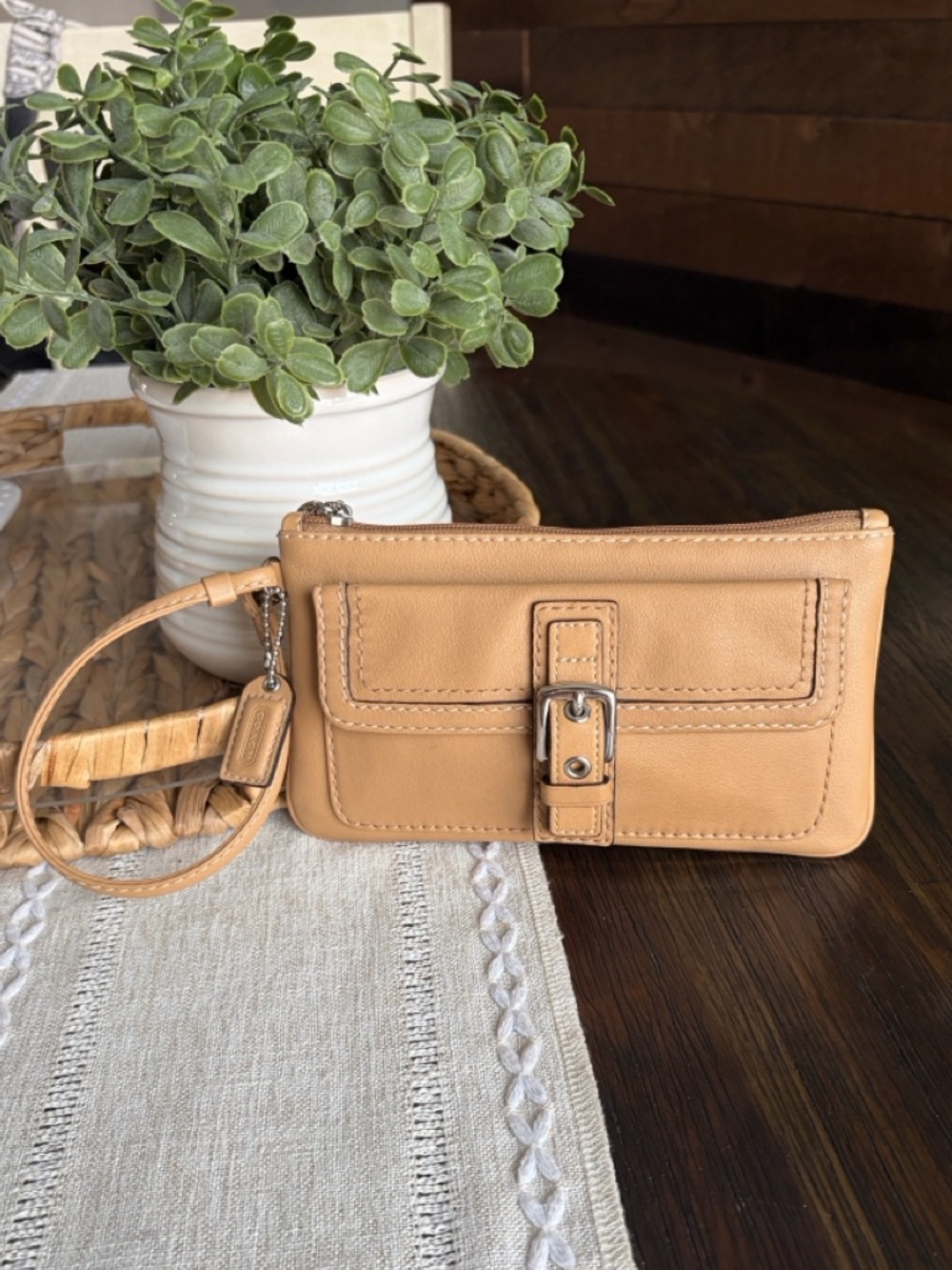 Vintage Coach Soho Leather wristlet clutch.